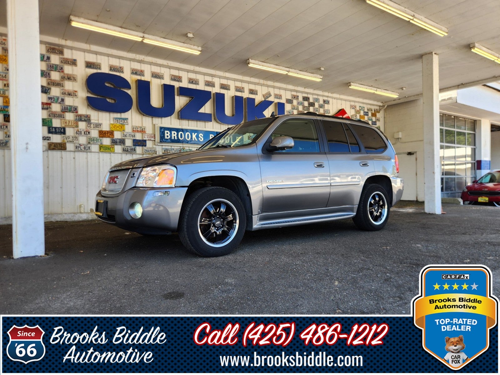 2009 GMC Envoy Denali in Steel Gray Metallic — front three-quarter view