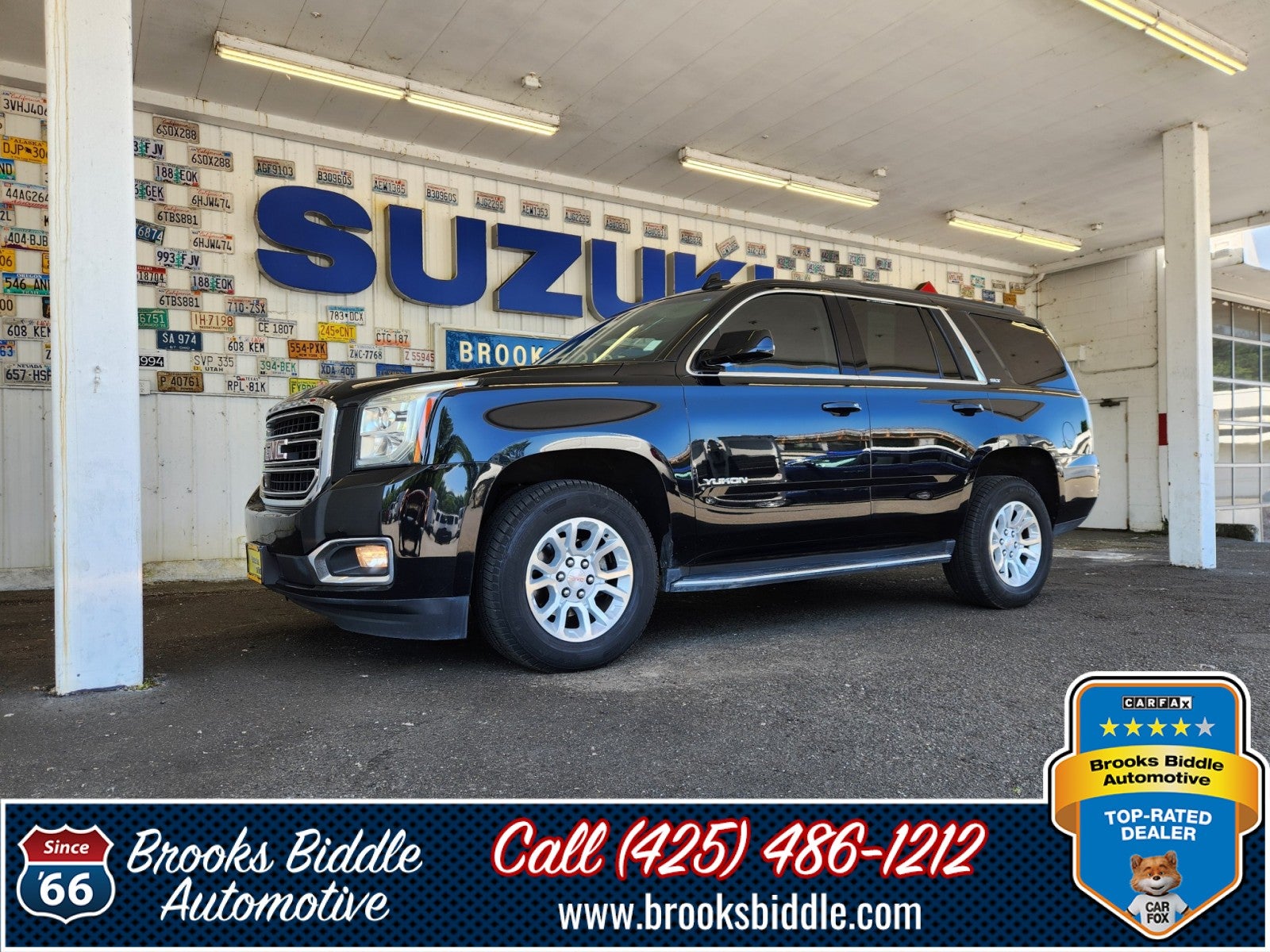 2018 GMC Yukon SLT in Onyx Black — front three-quarter view