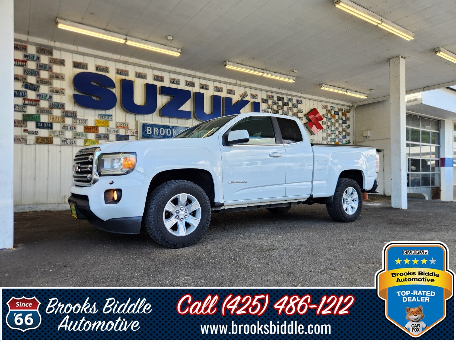 2016 GMC Canyon 4WD SLE in Summit White — front three-quarter view