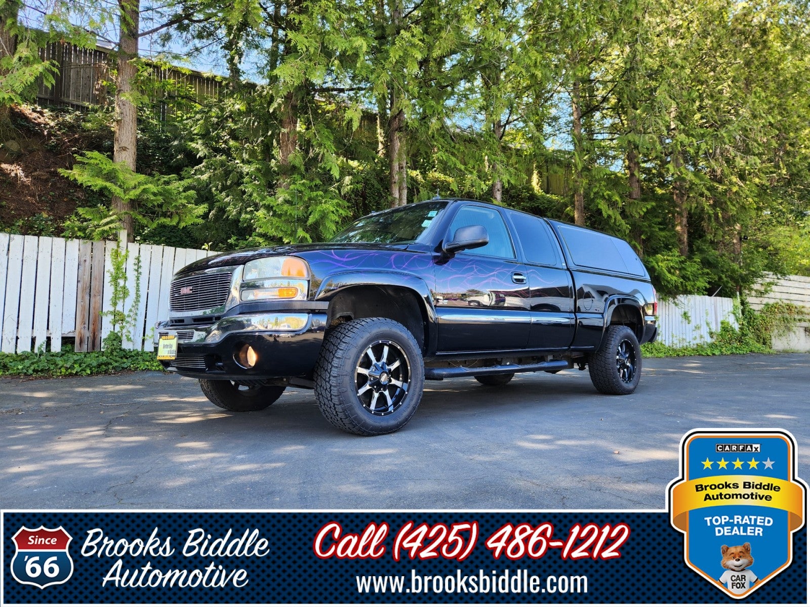 2003 GMC Sierra 2500HD SLT in Onyx Black — front three-quarter view