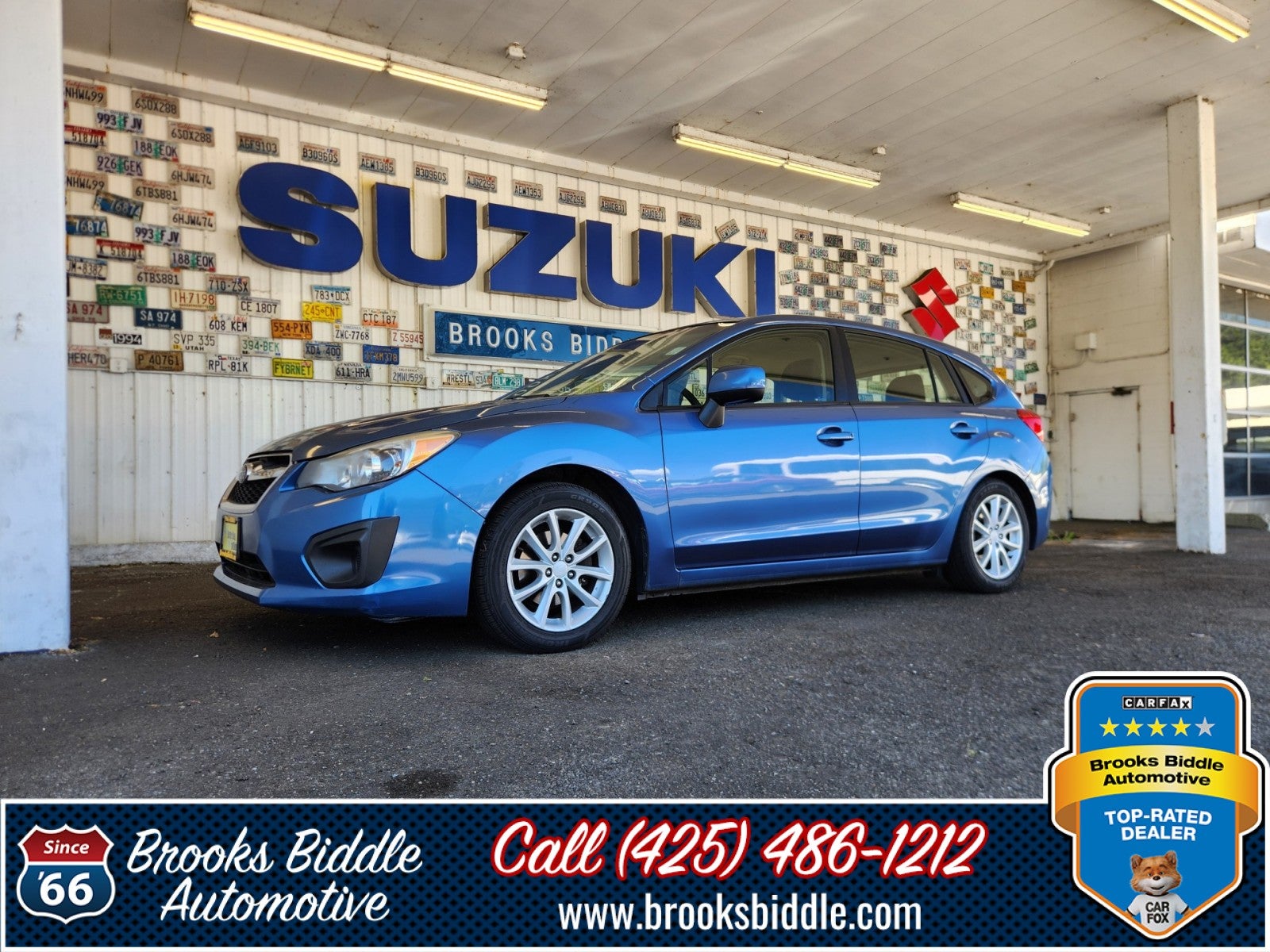 2014 Subaru Impreza Wagon 2.0i Premium in Quartz Blue Pearl — front three-quarter view