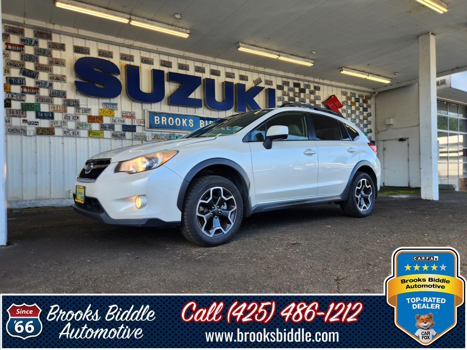 2014 Subaru XV Crosstrek 2.0i Limited in Satin White Pearl — front three-quarter view