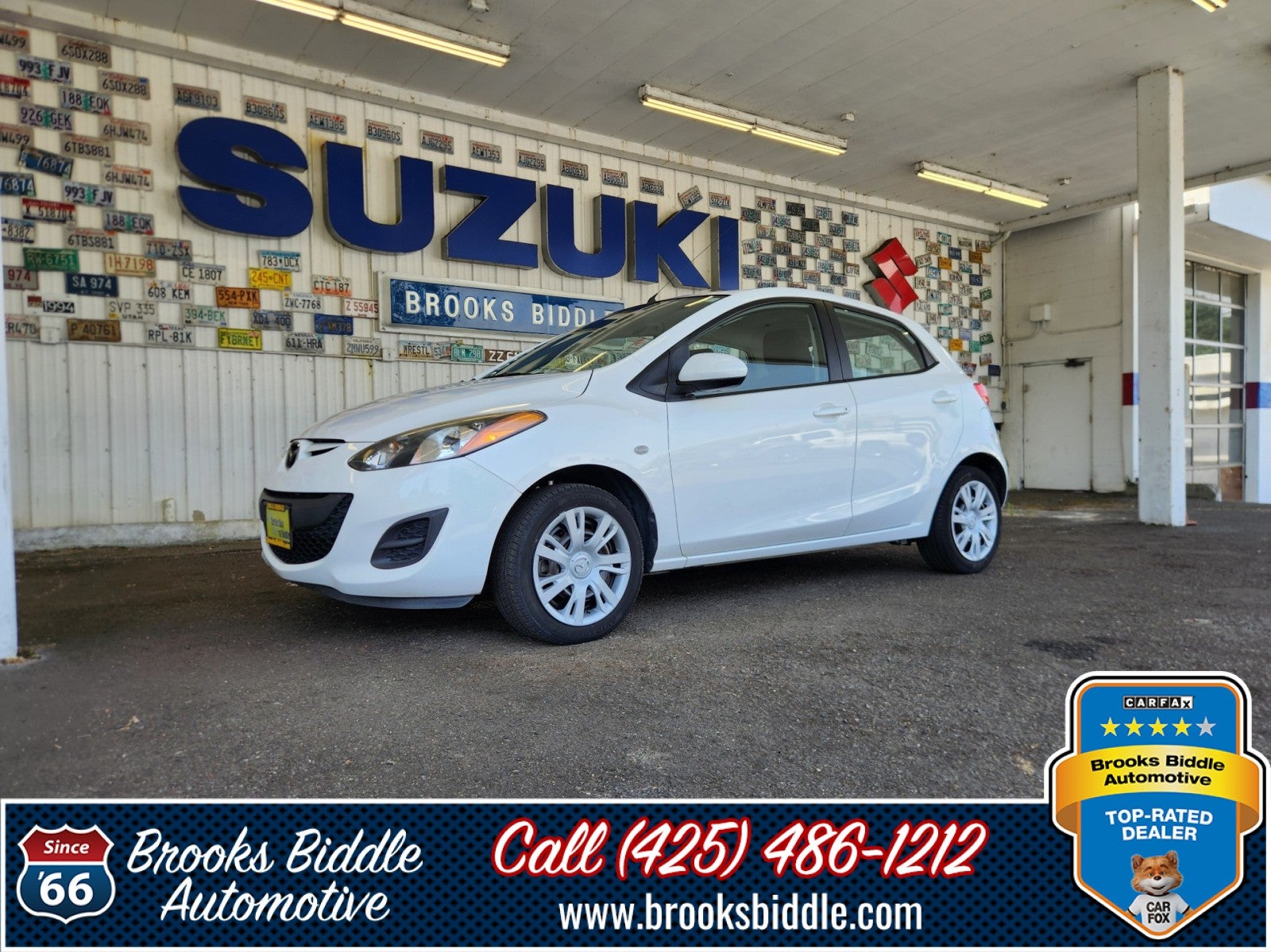 2012 Mazda Mazda2 Sport in Crystal White Pearl — front three-quarter view