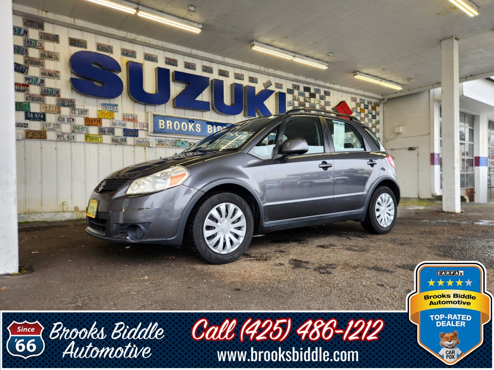 2010 Suzuki SX4 Technology in Azure Grey Metallic — front three-quarter view